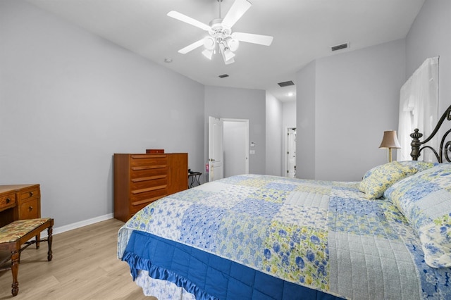 923 SW 85th Way, Gainesville, FL 32607 - bedroom with light wood-style floors, baseboards, and ceiling fan