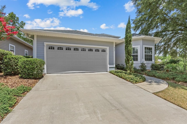 923 SW 85th Way, Gainesville, FL 32607 - ranch-style house with concrete driveway and a garage