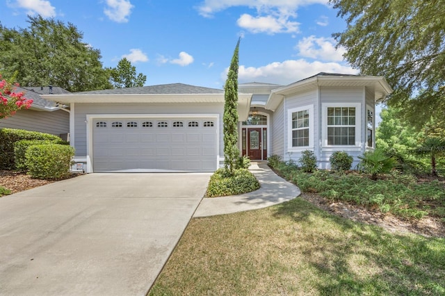 923 SW 85th Way, Gainesville, FL 32607 - view of front of home featuring driveway and an attached garage