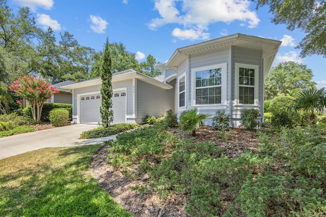 923 SW 85th Way, Gainesville, FL 32607 - ranch-style home featuring an attached garage and concrete driveway