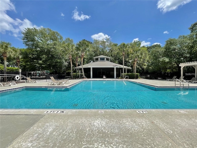 923 SW 85th Way, Gainesville, FL 32607 - community pool featuring view of scattered trees and a patio