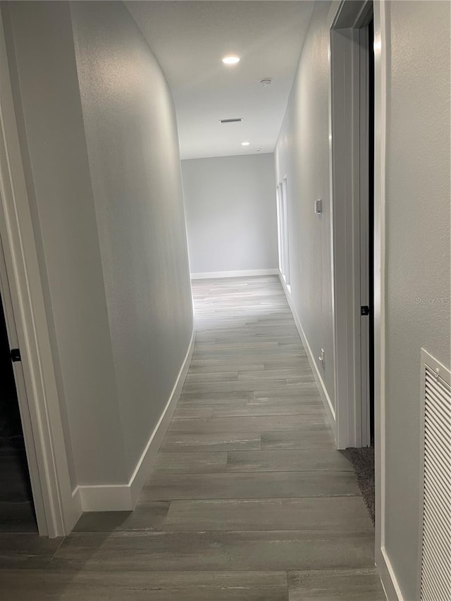 2518 Sunset Ln, Lutz, FL 33559 - hallway with wood finished floors and recessed lighting