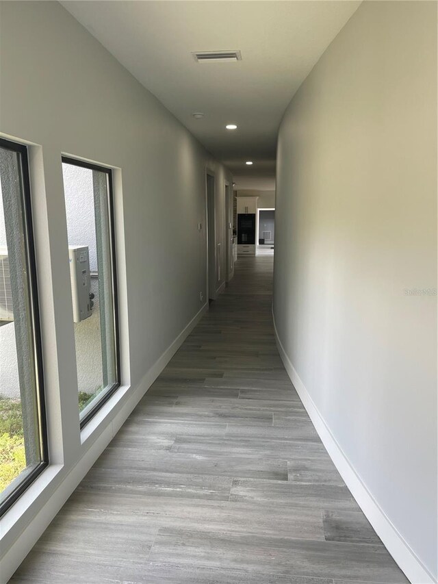 2518 Sunset Ln, Lutz, FL 33559 - hall featuring recessed lighting and wood finished floors