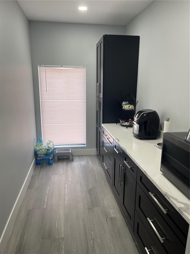 2518 Sunset Ln, Lutz, FL 33559 - bathroom with wood finished floors and recessed lighting