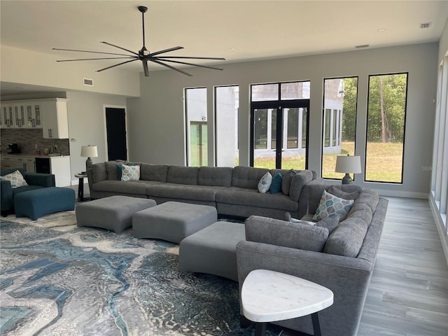 2518 Sunset Ln, Lutz, FL 33559 - living area with wood finished floors and ceiling fan
