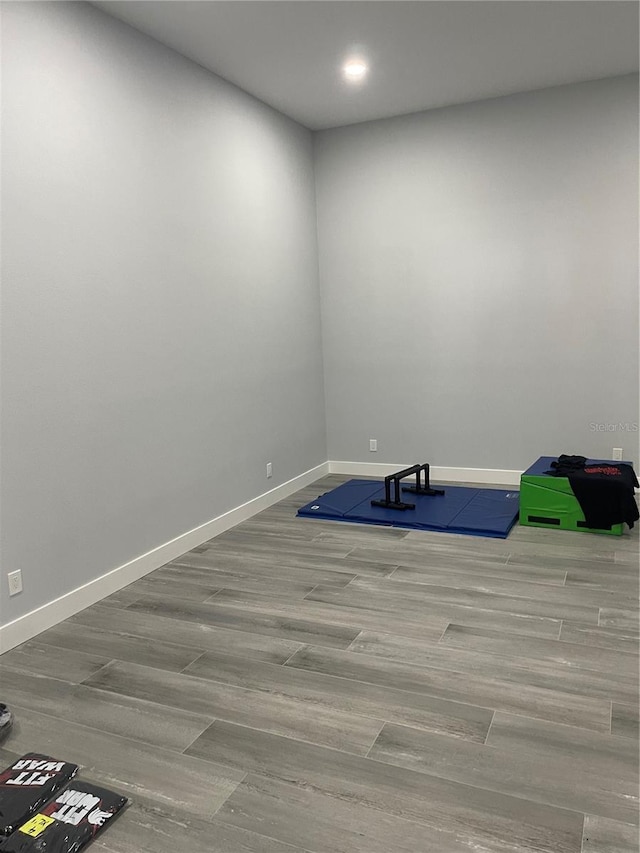 2518 Sunset Ln, Lutz, FL 33559 - exercise area featuring wood finished floors and recessed lighting
