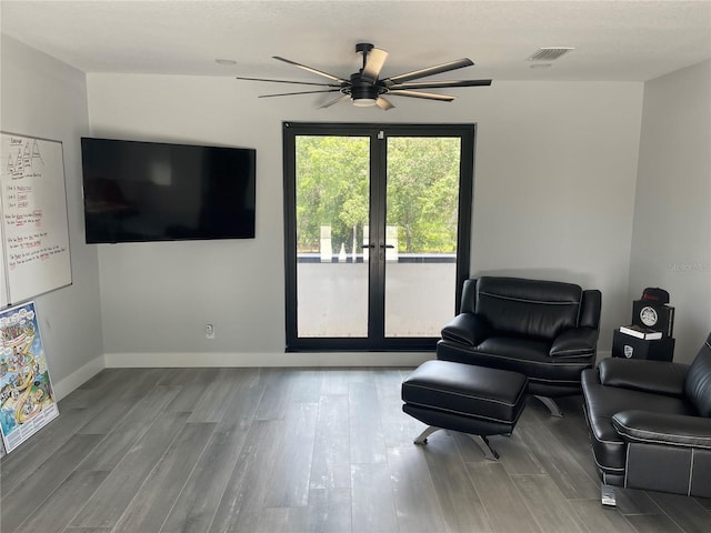 2518 Sunset Ln, Lutz, FL 33559 - sitting room with ceiling fan and wood finished floors