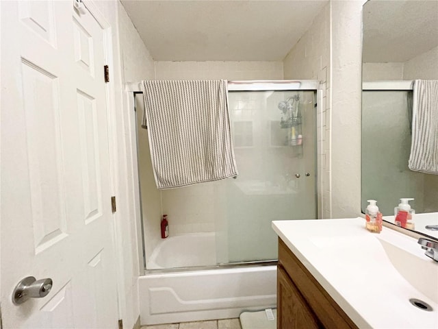 2811 SW Archer Rd Unit T164, Gainesville, FL 32608 - bathroom featuring vanity, shower / bath combination with glass door, and tile patterned floors