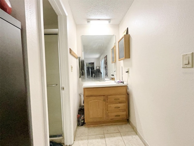 2811 SW Archer Rd Unit T164, Gainesville, FL 32608 - bathroom with vanity and a textured ceiling