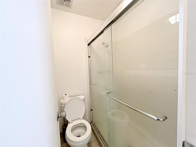 2811 SW Archer Rd Unit T164, Gainesville, FL 32608 - bathroom featuring a stall shower and toilet