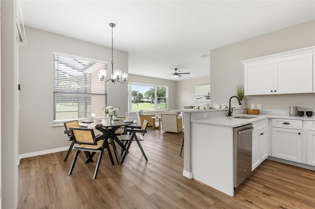 1044 SW 159th St, Ocala, FL 34473 - kitchen featuring a sink, stainless steel dishwasher, and light wood-style floors