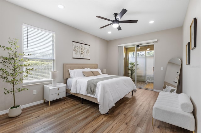 1044 SW 159th St, Ocala, FL 34473 - bedroom featuring access to exterior, multiple windows, light wood-type flooring, and recessed lighting