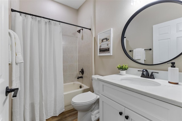1044 SW 159th St, Ocala, FL 34473 - bathroom featuring vanity, toilet, shower / tub combo with curtain, and wood finished floors