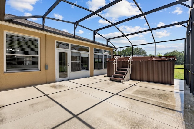 1044 SW 159th St, Ocala, FL 34473 - view of patio featuring a hot tub and a lanai