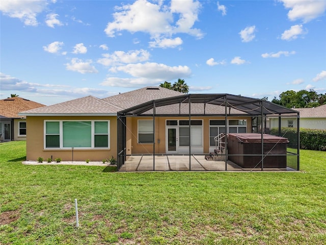 1044 SW 159th St, Ocala, FL 34473 - back of house featuring a patio, a hot tub, stucco siding, a yard, and a lanai
