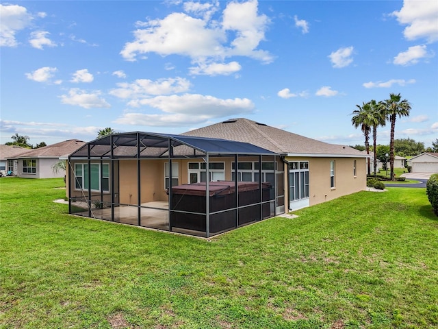 1044 SW 159th St, Ocala, FL 34473 - rear view of property with a hot tub, a yard, and stucco siding