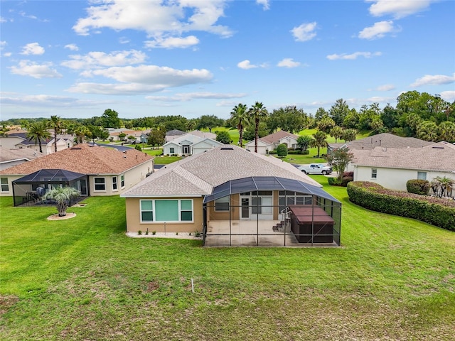 1044 SW 159th St, Ocala, FL 34473 - back of property with a residential view, a lawn, a lanai, a patio area, and stucco siding