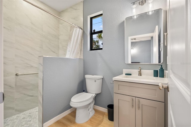 5479 S Biscayne Dr, North Port, FL 34287 - full bath featuring vanity, wood finished floors, tiled shower, and toilet