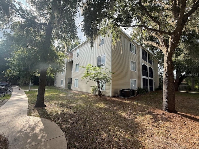 3800 SW 20th Ave Unit 611, Gainesville, FL 32607 - view of home's exterior featuring central AC