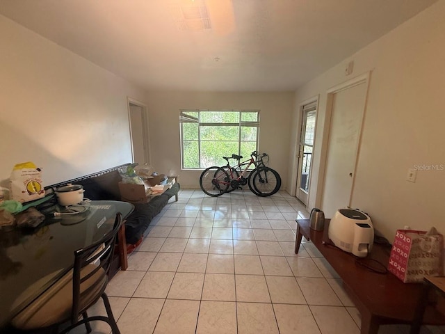 3800 SW 20th Ave Unit 611, Gainesville, FL 32607 - living room with light tile patterned floors