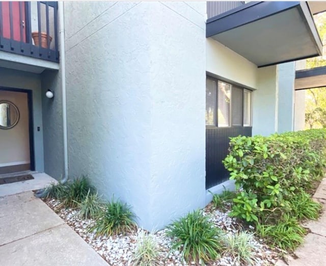 401 NW 39th Rd Unit 401C, Gainesville, FL 32607 - property entrance featuring stucco siding