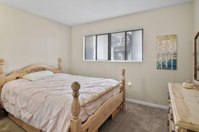401 NW 39th Rd Unit 401C, Gainesville, FL 32607 - carpeted bedroom featuring baseboards