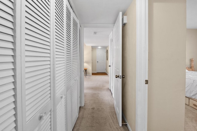 401 NW 39th Rd Unit 401C, Gainesville, FL 32607 - hall with light carpet and baseboards