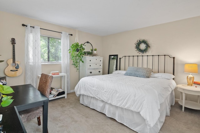401 NW 39th Rd Unit 401C, Gainesville, FL 32607 - bedroom featuring carpet