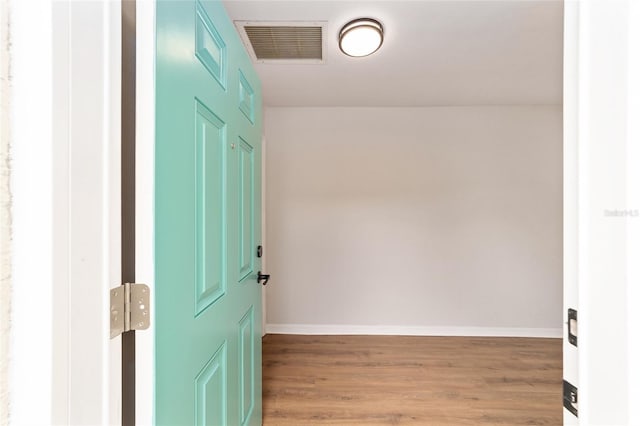 6245 NW 106th Pl Unit 6245, Alachua, FL 32615 - foyer featuring light wood-style floors and baseboards