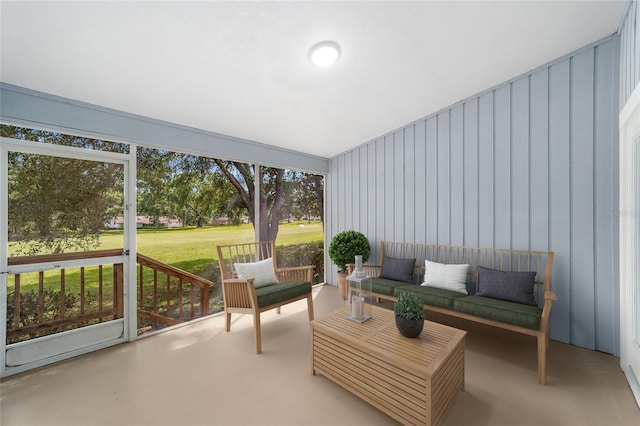 6245 NW 106th Pl Unit 6245, Alachua, FL 32615 - sunroom with an outdoor hangout area