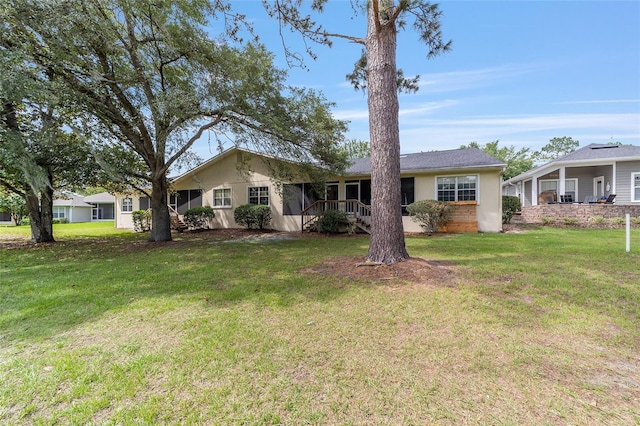 6245 NW 106th Pl Unit 6245, Alachua, FL 32615 - single story home featuring a front yard and stucco siding