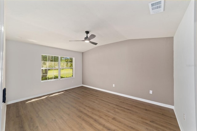 6245 NW 106th Pl Unit 6245, Alachua, FL 32615 - empty room with ceiling fan, lofted ceiling, wood finished floors, and baseboards