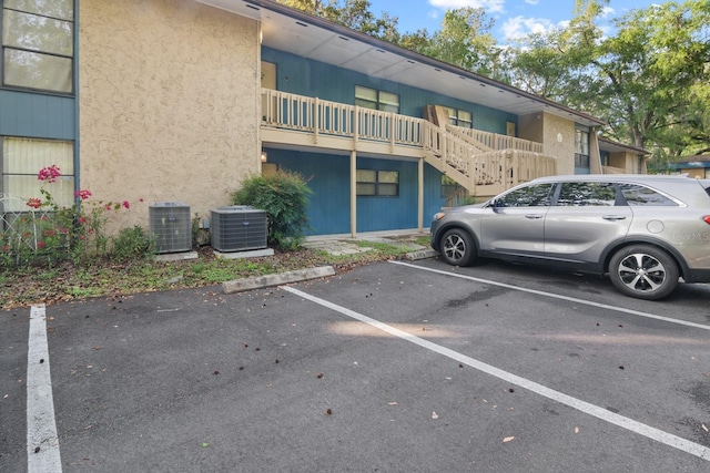 2811 SW Archer Rd Unit O123, Gainesville, FL 32608 - uncovered parking lot with stairway