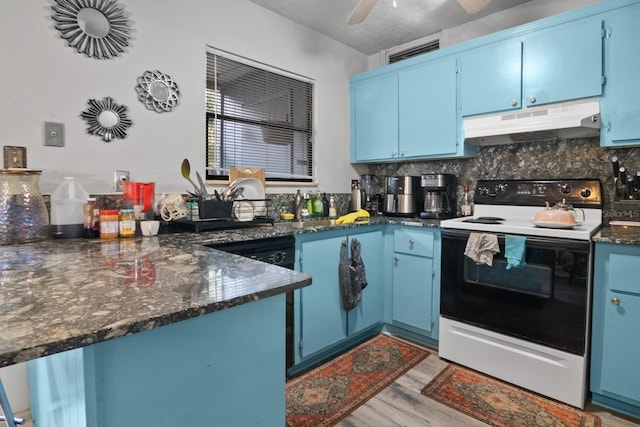 2811 SW Archer Rd Unit O123, Gainesville, FL 32608 - kitchen with under cabinet range hood, electric range oven, and blue cabinets