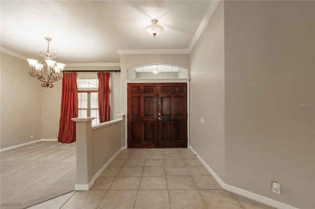 5119 NW 57th St, Gainesville, FL 32653 - entryway with a chandelier, crown molding, and baseboards