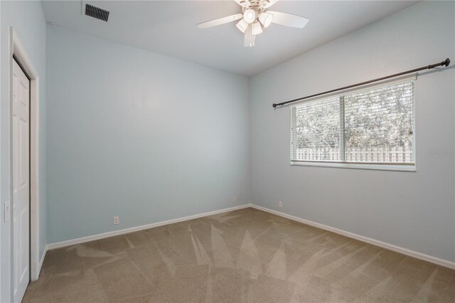 5119 NW 57th St, Gainesville, FL 32653 - unfurnished bedroom with carpet, baseboards, and ceiling fan