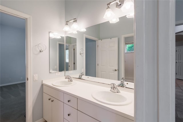 5119 NW 57th St, Gainesville, FL 32653 - full bath with double vanity and baseboards