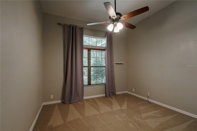 5119 NW 57th St, Gainesville, FL 32653 - spare room with a ceiling fan, light carpet, and baseboards