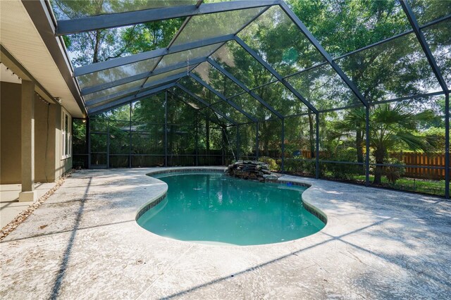 5119 NW 57th St, Gainesville, FL 32653 - view of swimming pool featuring a patio area and glass enclosure