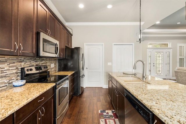 2898 SW 117th Way, Gainesville, FL 32608 - kitchen with stainless steel appliances, a sink, ornamental molding, dark wood-style floors, and decorative backsplash