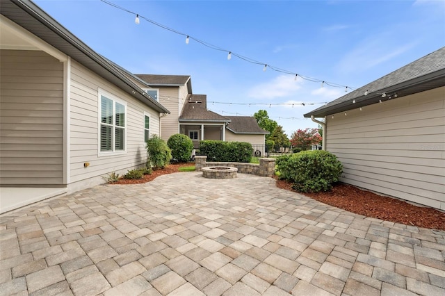 2898 SW 117th Way, Gainesville, FL 32608 - view of patio / terrace featuring an outdoor fire pit
