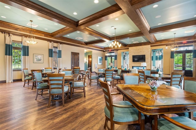 2898 SW 117th Way, Gainesville, FL 32608 - dining area featuring plenty of natural light, wood finished floors, baseboards, beam ceiling, and coffered ceiling