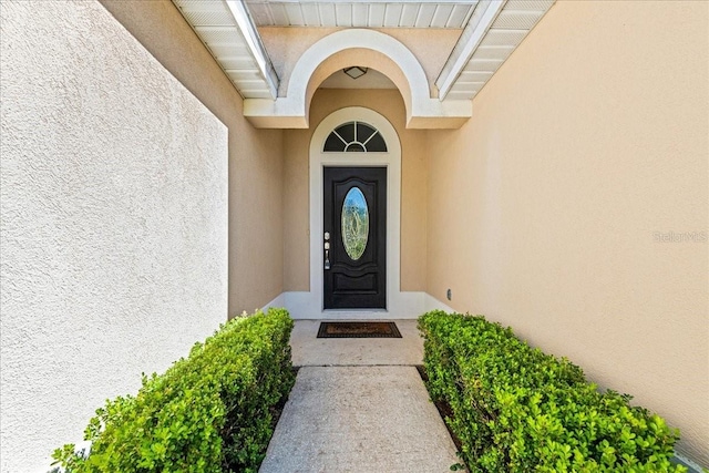 11737 Creek Dr, Alachua, FL 32615 - property entrance featuring stucco siding