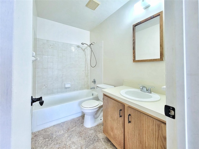 2300 SW 43rd St Unit L2, Gainesville, FL 32607 - full bathroom featuring toilet, vanity, and tub / shower combination
