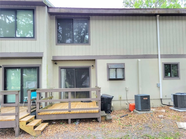 2300 SW 43rd St Unit L2, Gainesville, FL 32607 - back of house with a deck and central AC