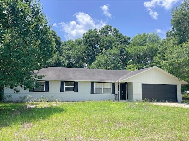 395 SW Grove St, Keystone Heights, FL 32656 - single story home with a garage and roof with shingles