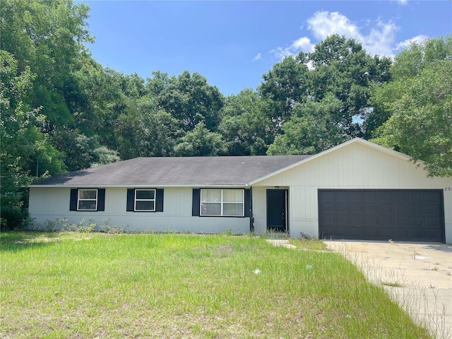 395 SW Grove St, Keystone Heights, FL 32656 - ranch-style house with an attached garage, driveway, and a front yard