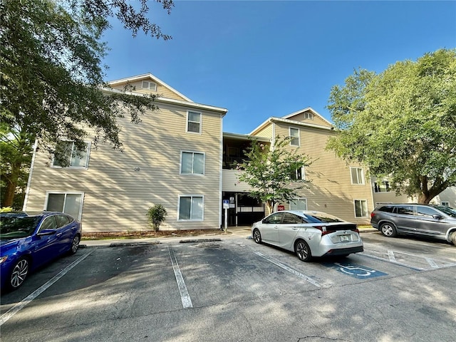 3800 SW 20th Ave Unit 308, Gainesville, FL 32607 - view of property featuring uncovered parking