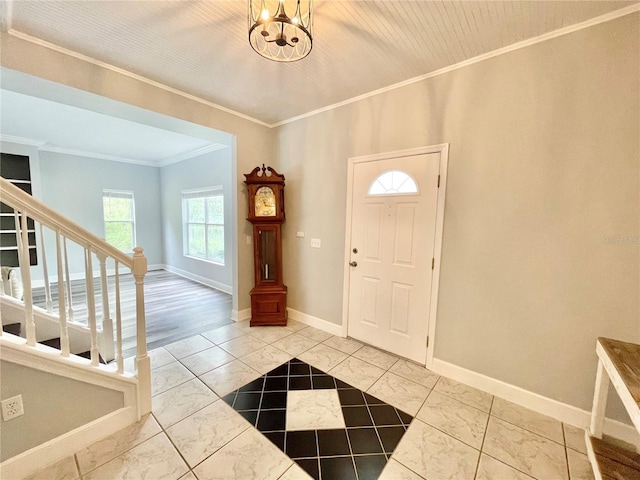 5510 NW 80th Ave, Gainesville, FL 32653 - foyer featuring crown molding, stairs, baseboards, and a chandelier