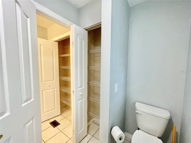 5510 NW 80th Ave, Gainesville, FL 32653 - bathroom with tile patterned flooring and toilet